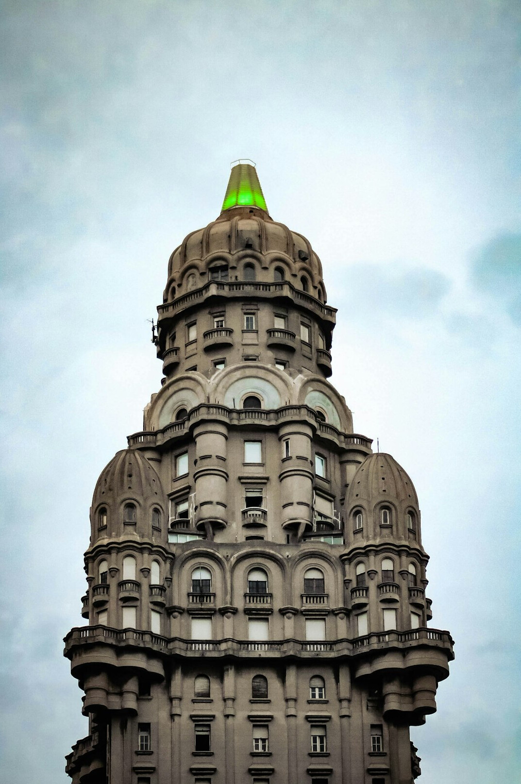 Palacio Salvo tower in Montevideo at dusk with dramatic sky
