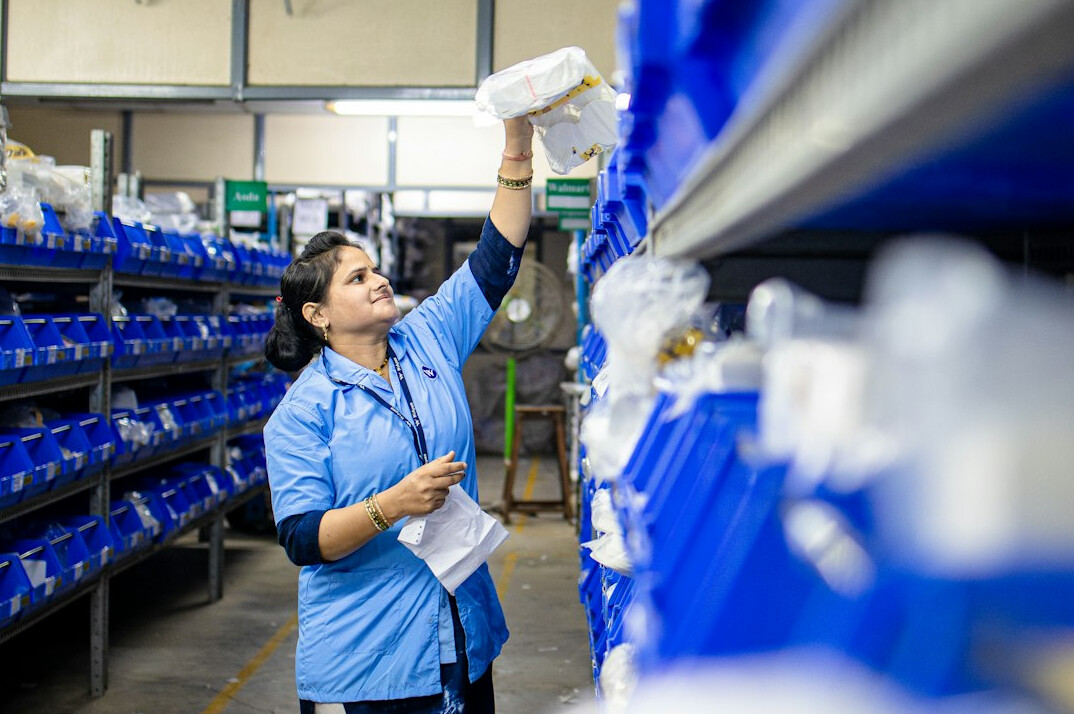 retail employee checking inventory