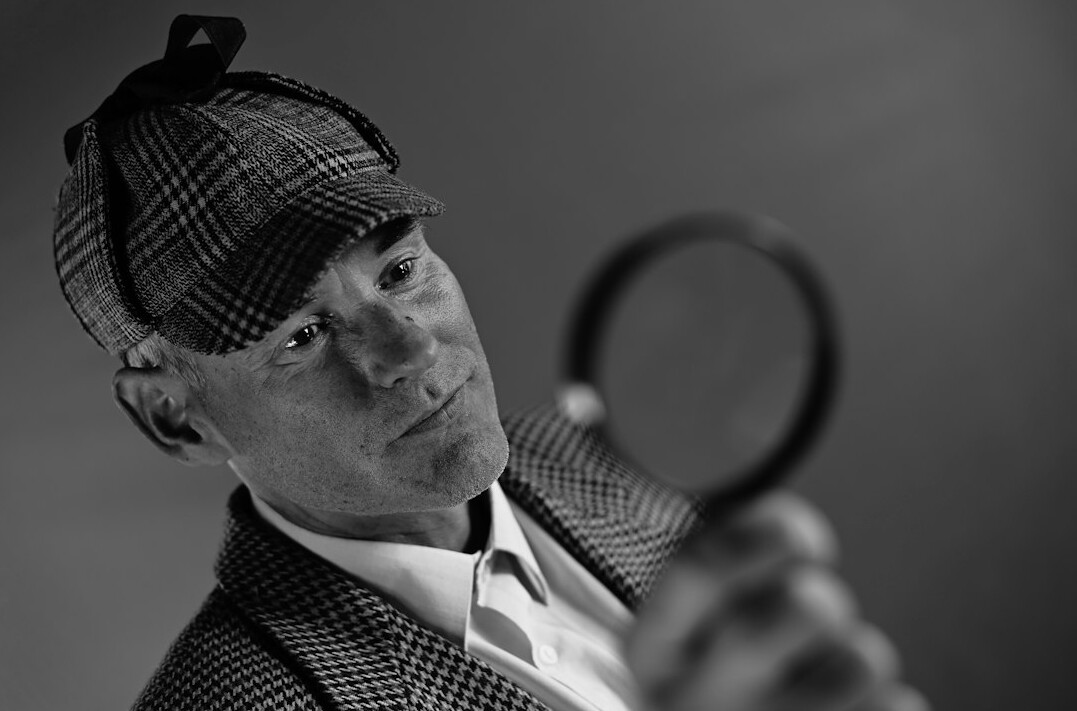 detective reviewing security footage